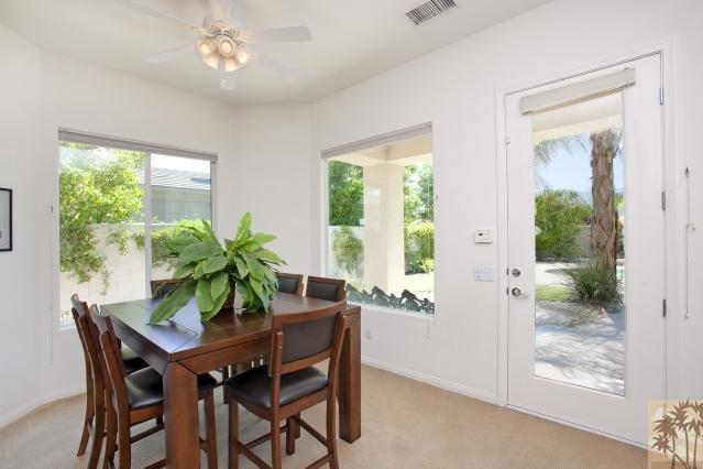 5 Champagne Circle Rancho Mirage, CA 92270 - Photo 8 of 24 a view of a dining room with furniture window and outside view