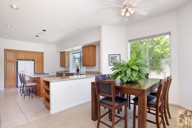5 Champagne Circle Rancho Mirage, CA 92270 - Photo 9 of 24 a view of a dining room with furniture and window