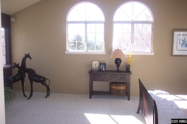 7187 Blue Falls Circle Reno, NV 89511 - Photo 3 of 5 a living room with furniture and a window