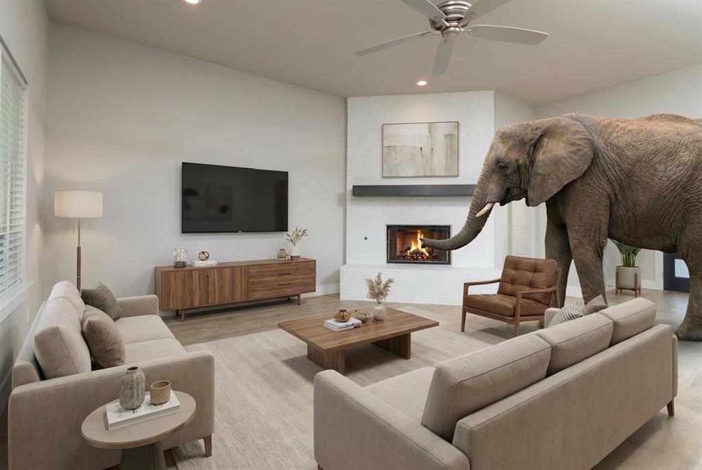 As for the elephant in the room… well, at least here it’s literal. The good news is this space is so large it actually can handle most furniture. He seems to have taken over fireplace duty and looks like he’s warming his trunk. Hopefully he’s house-trained and doesn’t expect peanuts with the mortgage. ???? (Staged)
