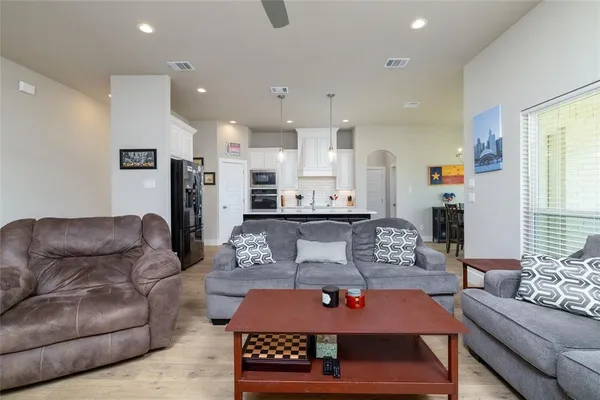 a living room with furniture and a couch