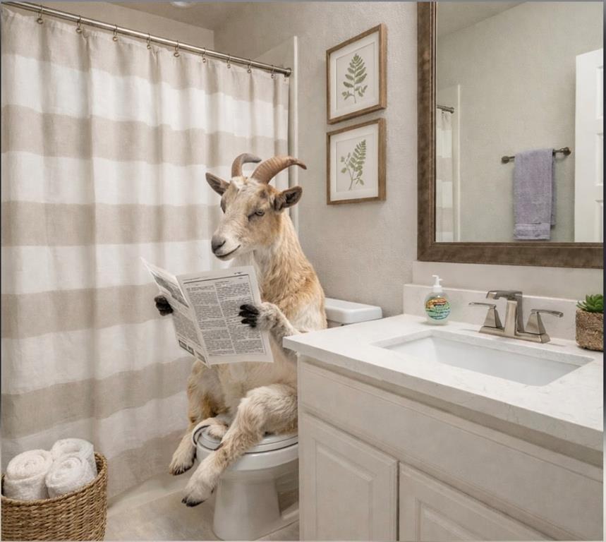 321 Monument Pl. Azle, TX 76020 - Photo 26 of 37 And apparently… it’s also a great place to catch up on the morning news. ?? The previous owner clearly felt right at home—proof that even a goat could get comfortable in this bathroom. Don’t worry though, the current occupants have moved on and left the space ready for its next owners! (Staged)