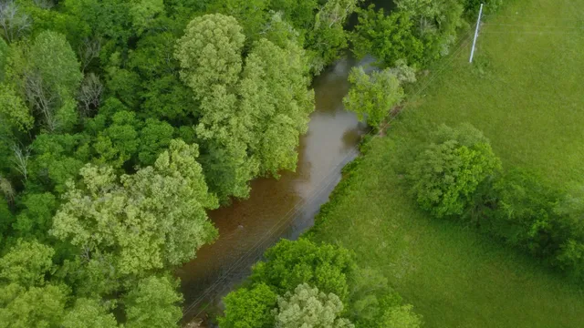 a view of a lake with a yard