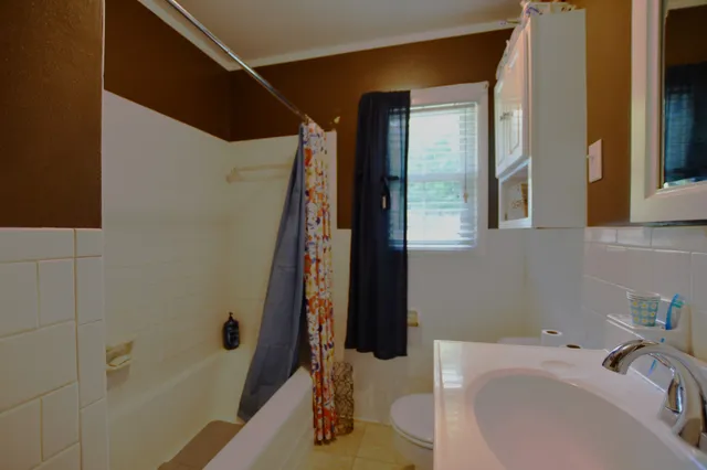 a bathroom with a sink and a tub