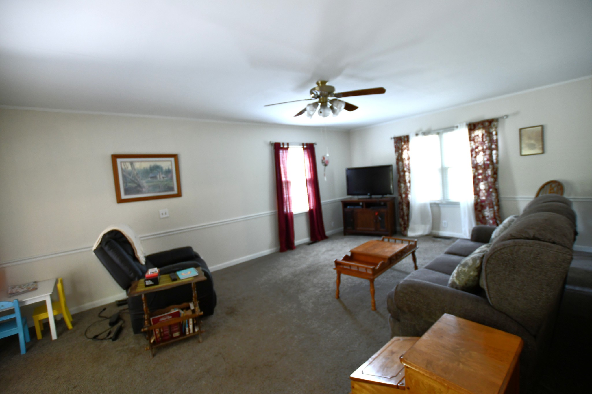 9073 Sherwood Road Sherwood, TN 37376 - Photo 41 of 45 a living room with furniture and a flat screen tv