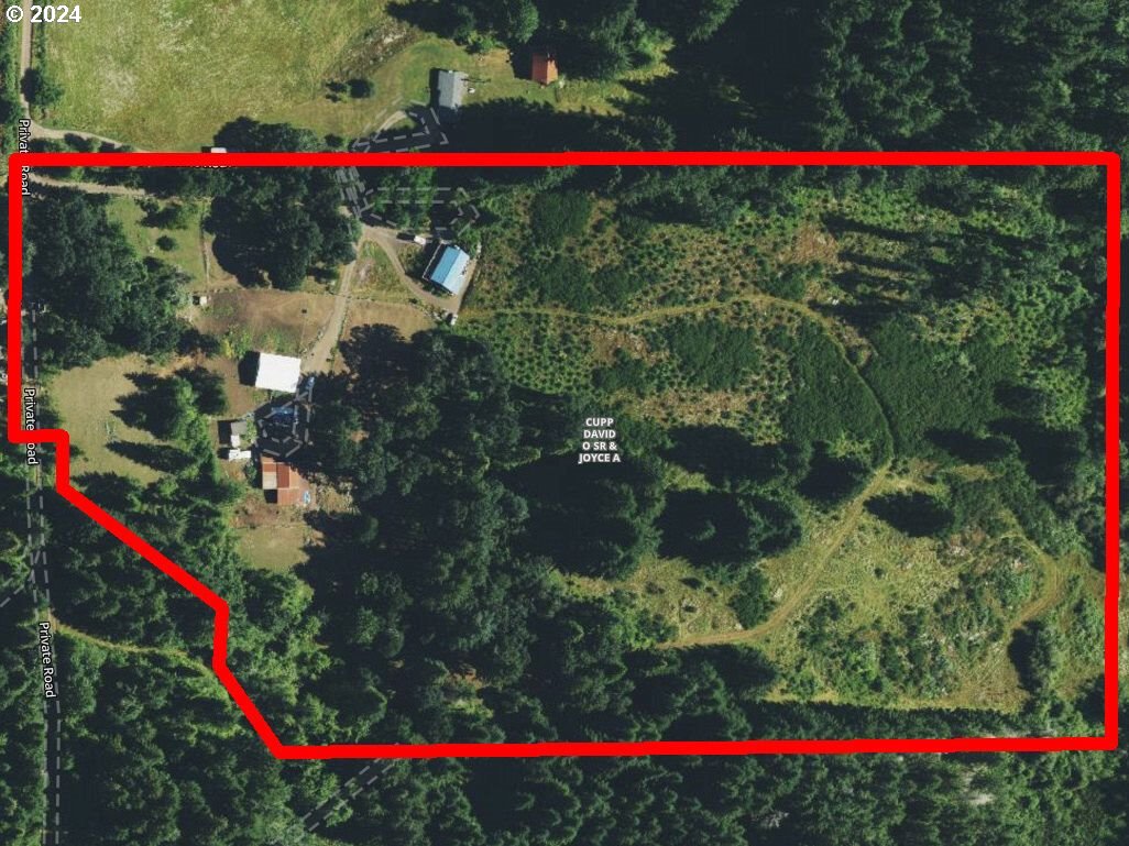 28250 Andy Riggs Road Grand Ronde, OR 97347 - Photo 3 of 48 a view of a red and white house
