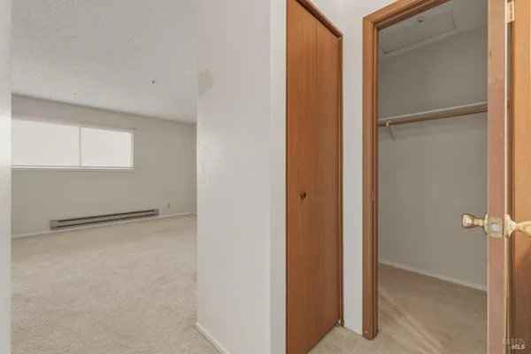a view of a room with racks on the wall