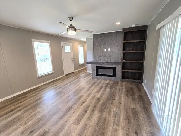 a view of a tree in a yard