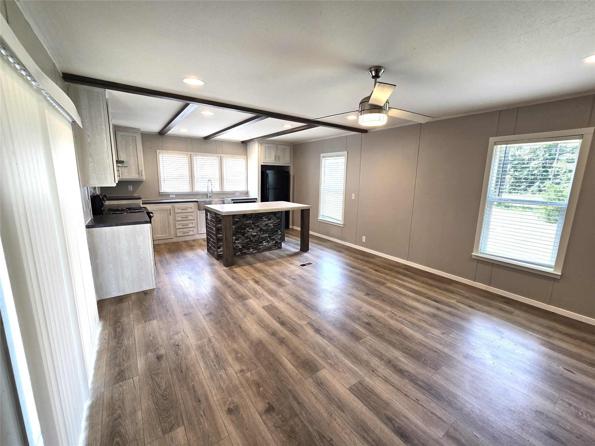 215 Buffalo Way Drive Trinity, TX 75862 - Photo 14 of 17 a view of a kitchen with furniture wooden floor and window