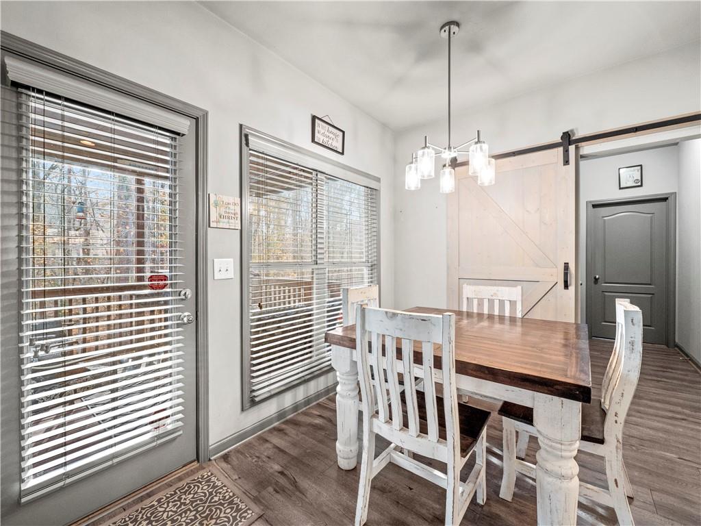 816 Mimosa Way Jefferson, GA 30549 - Photo 12 of 43 a dining room with furniture and window