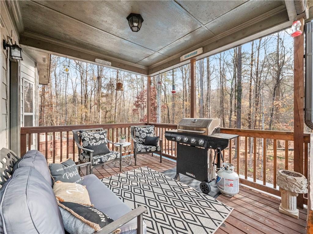 816 Mimosa Way Jefferson, GA 30549 - Photo 14 of 43 a living room with a large window