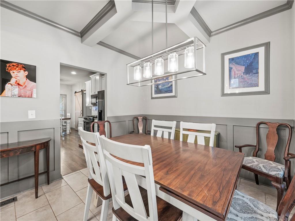 816 Mimosa Way Jefferson, GA 30549 - Photo 18 of 43 a dining room with furniture and window