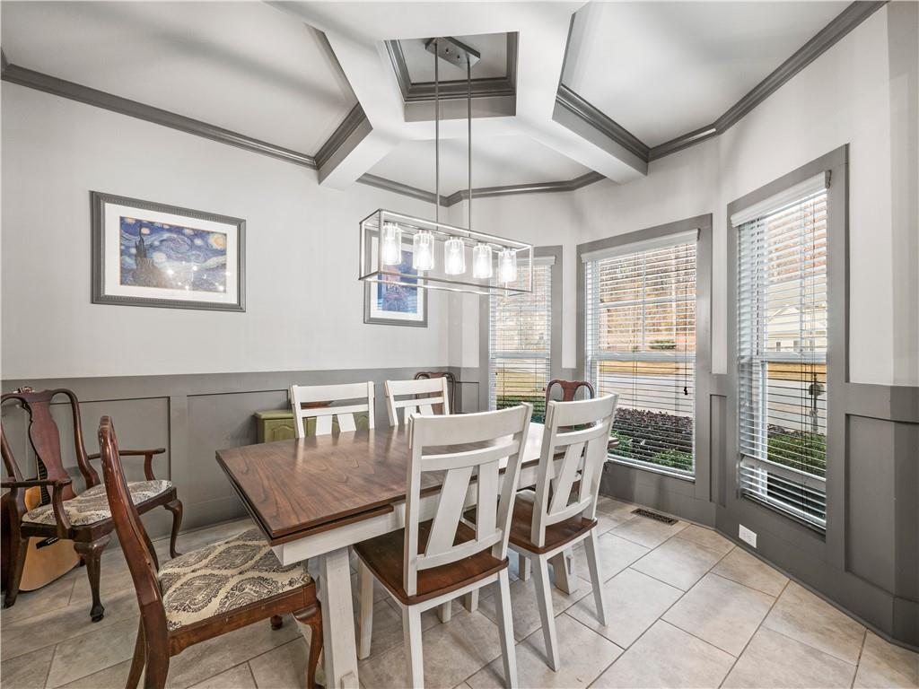 816 Mimosa Way Jefferson, GA 30549 - Photo 19 of 43 a view of a dining room with furniture window and outside view