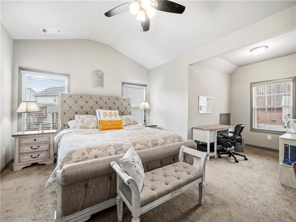 816 Mimosa Way Jefferson, GA 30549 - Photo 20 of 43 a bedroom with a bed and wooden floor