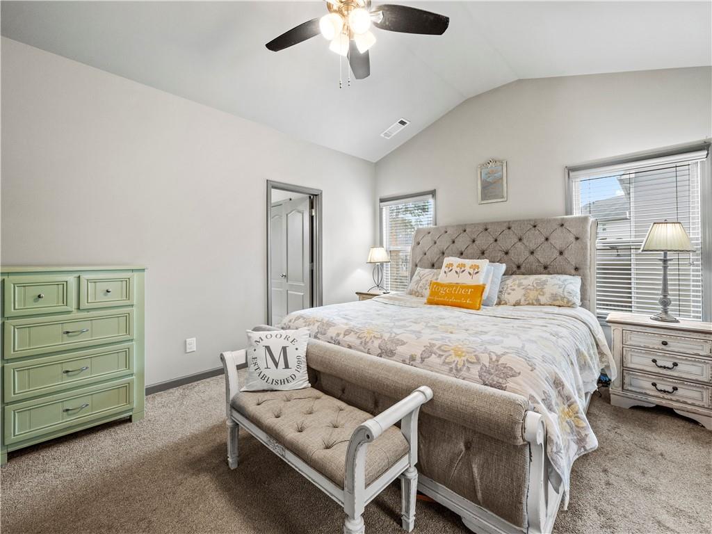 816 Mimosa Way Jefferson, GA 30549 - Photo 21 of 43 a bedroom with a bed and ceiling fan