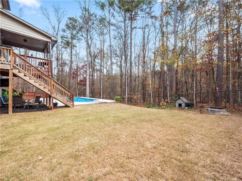 816 Mimosa Way Jefferson, GA 30549 - Photo 38 of 43 a view of a house with a snow on the road