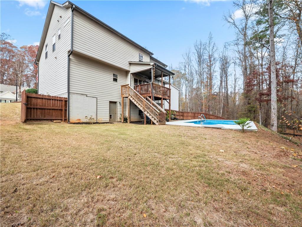 816 Mimosa Way Jefferson, GA 30549 - Photo 39 of 43 a house with trees in front of it