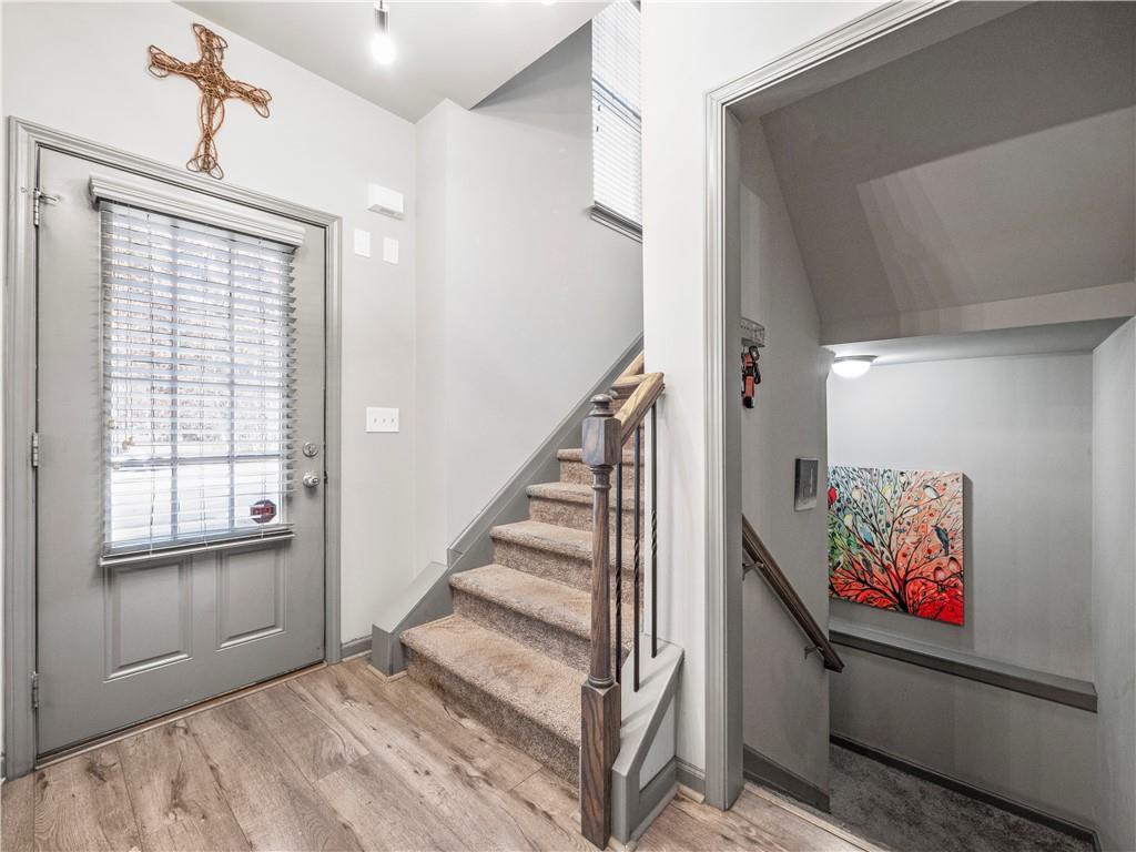 816 Mimosa Way Jefferson, GA 30549 - Photo 7 of 43 a view of entryway with stairs and wooden floor