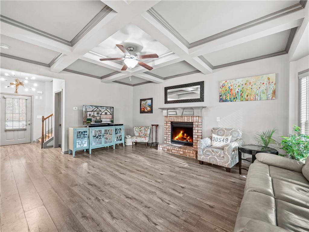 816 Mimosa Way Jefferson, GA 30549 - Photo 9 of 43 a living room with furniture and a fireplace