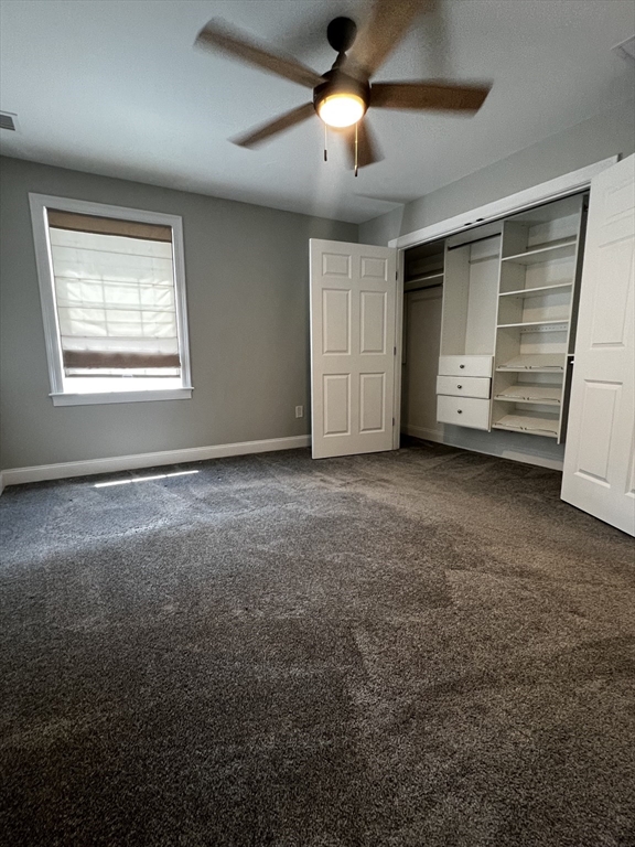 181 Christina Street, Unit 1 Newton, MA 02461 - Photo 13 of 24 a view of an empty room with a window