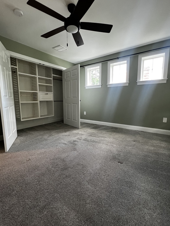 181 Christina Street, Unit 1 Newton, MA 02461 - Photo 15 of 24 a view of an empty room with a window