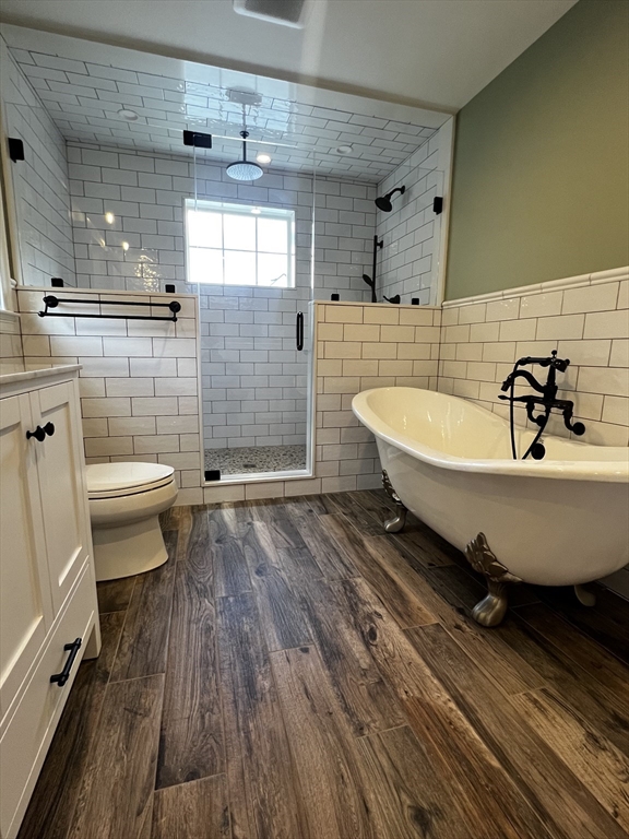 181 Christina Street, Unit 1 Newton, MA 02461 - Photo 17 of 24 a bathroom with a sink a toilet and shower