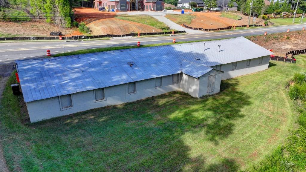 5680 Abbotts Bridge Road Johns Creek, GA 30097 - Photo 20 of 63 an aerial view of a houses with backyard