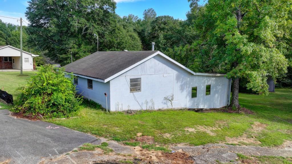 5680 Abbotts Bridge Road Johns Creek, GA 30097 - Photo 22 of 63 a view of a house with yard and a garden