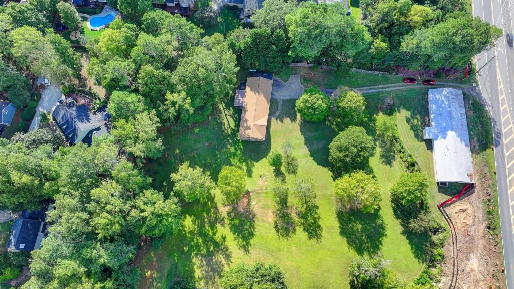 5680 Abbotts Bridge Road Johns Creek, GA 30097 - Photo 56 of 63 an aerial view of residential house with outdoor space and trees all around