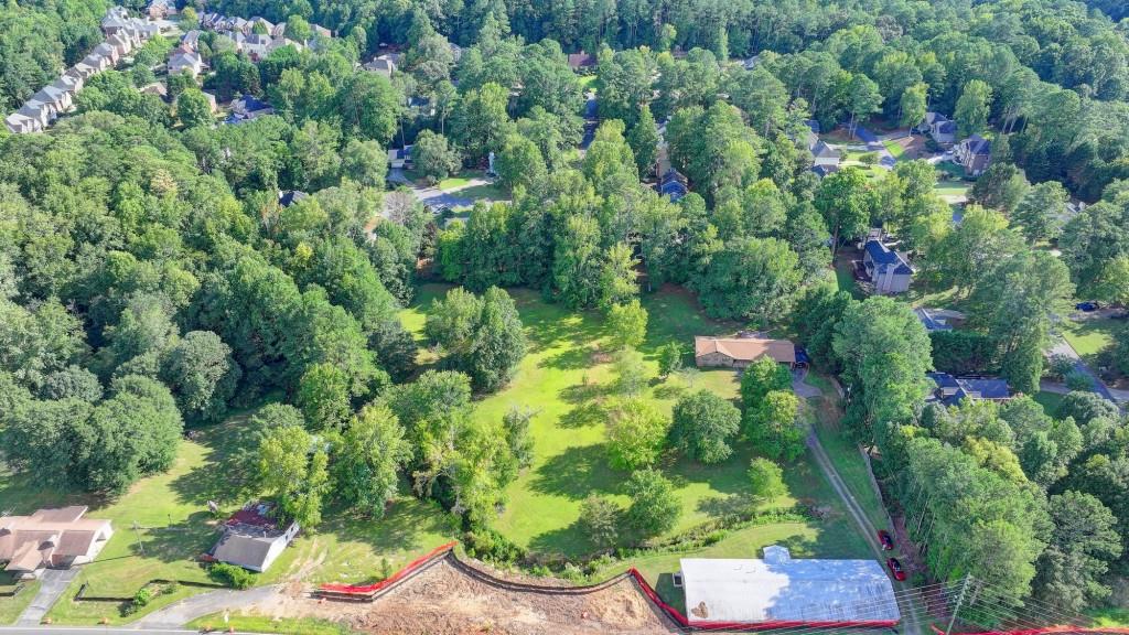 5680 Abbotts Bridge Road Johns Creek, GA 30097 - Photo 57 of 63 an aerial view of residential house with outdoor space and trees all around