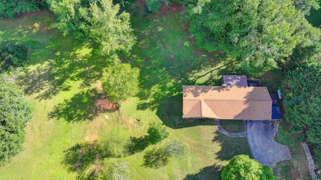 5680 Abbotts Bridge Road Johns Creek, GA 30097 - Photo 59 of 63 an aerial view of a house with a yard