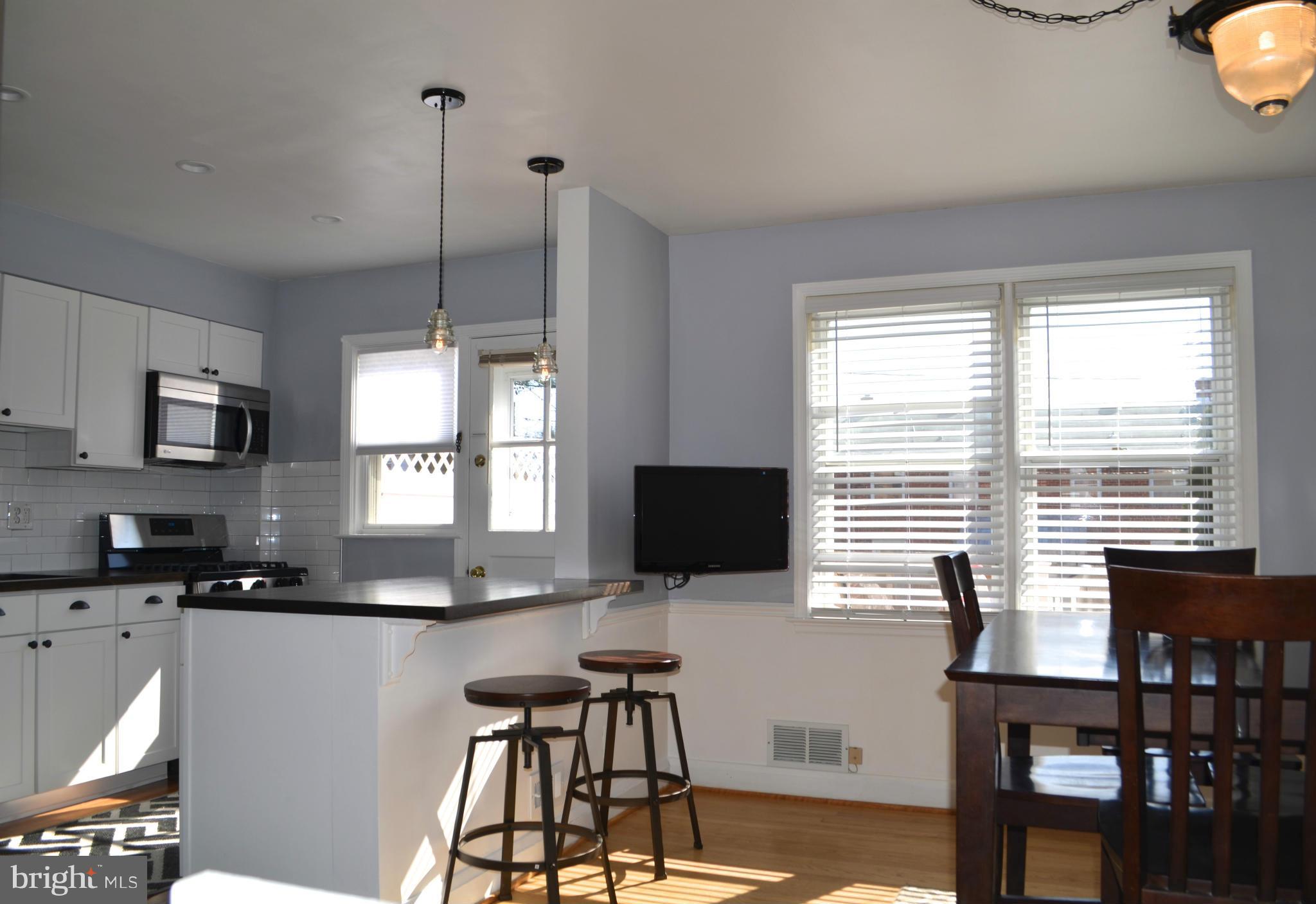 6109 Mt Ridge Road Baltimore, MD 21228 - Photo 4 of 26 Serene Dining Room that is open to kitchen