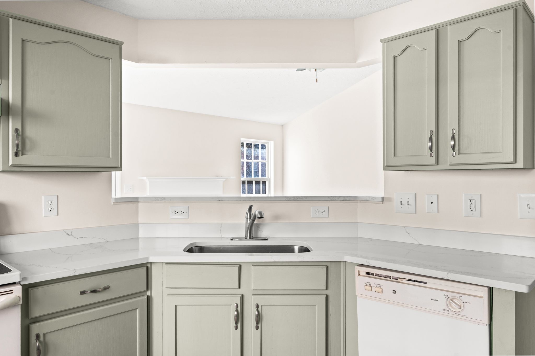 1304 West Running Brook Road Nashville, TN 37209 - Photo 13 of 28 a kitchen with stainless steel appliances granite countertop white cabinets sink and dishwasher