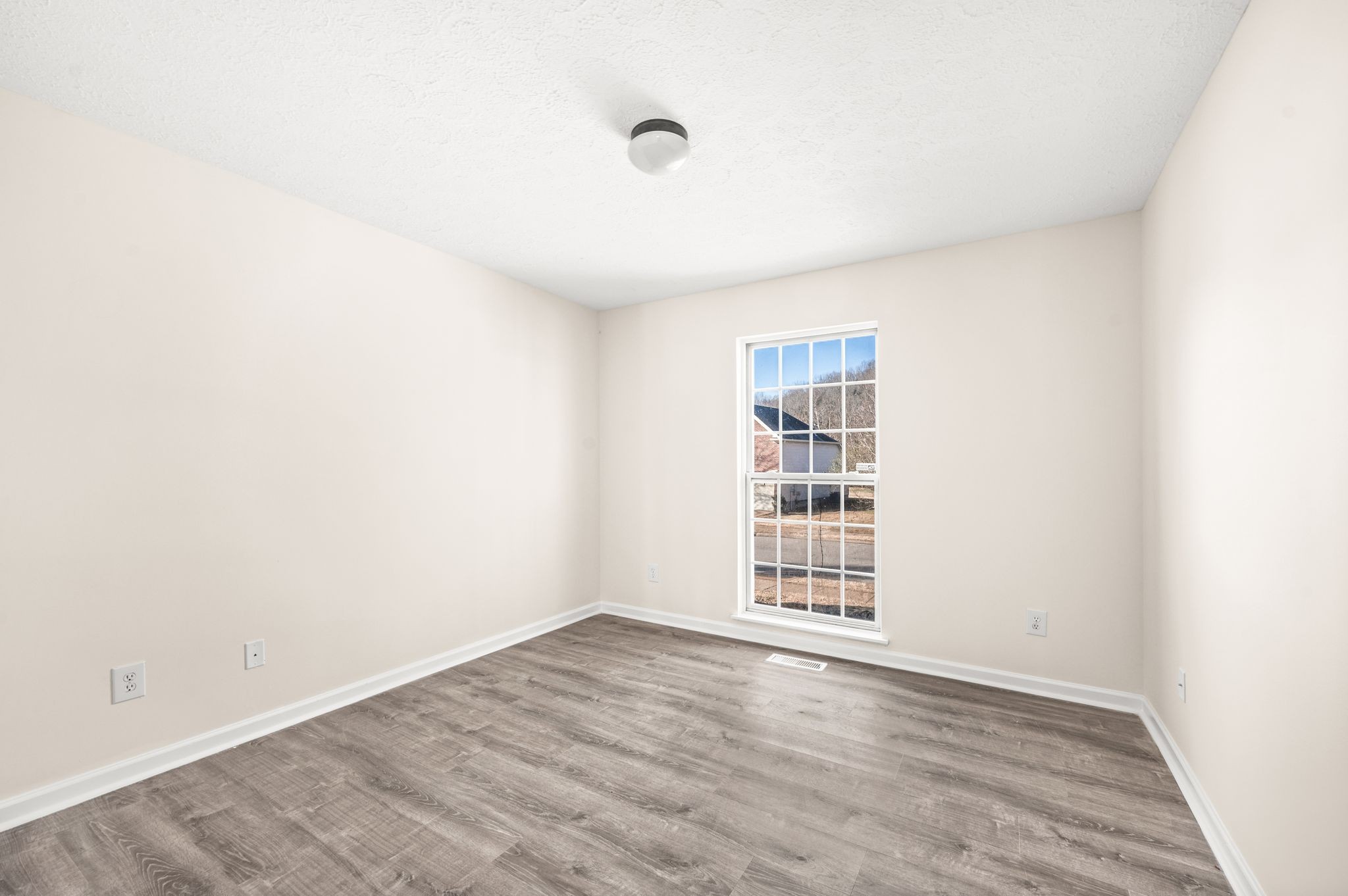 1304 West Running Brook Road Nashville, TN 37209 - Photo 21 of 28 an empty room with a empty space and a window