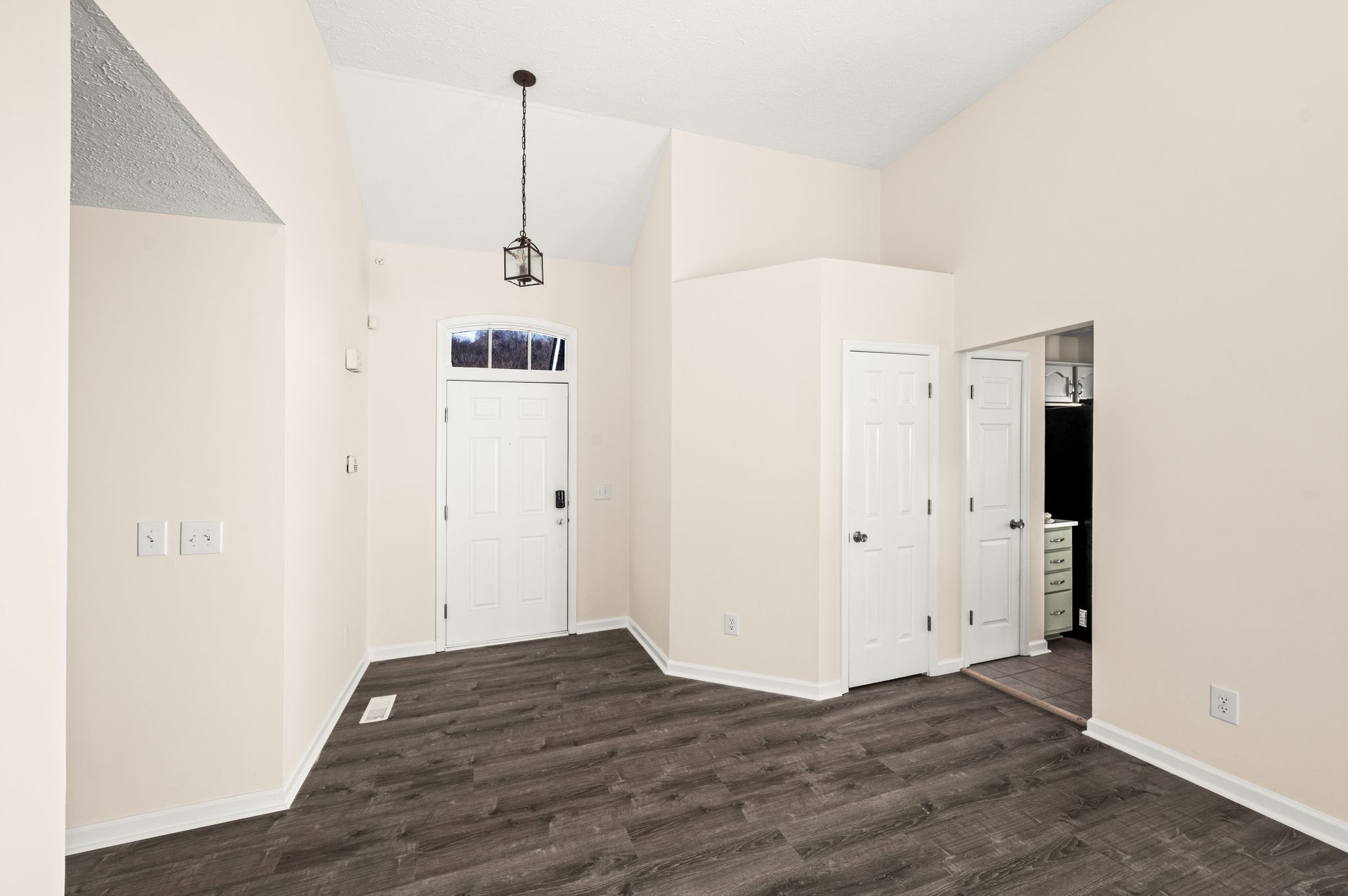 1304 West Running Brook Road Nashville, TN 37209 - Photo 5 of 28 a view of a room with wooden floor and a ceiling fan