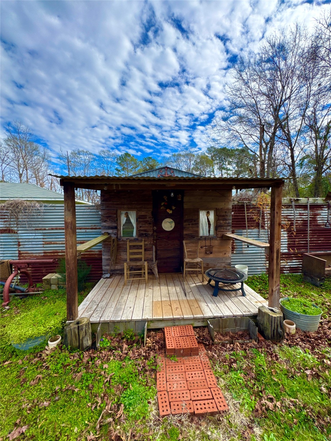 193 County Road 355 Jasper, TX 75951 - Photo 37 of 37 a view of a backyard with sitting area