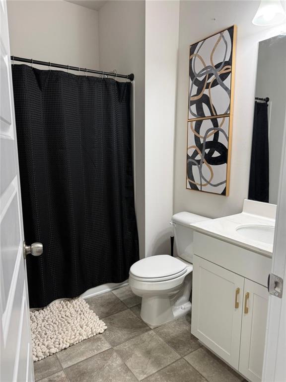 2115 Ravencliff Drive Austell, GA 30168 - Photo 19 of 21 a bathroom with a sink toilet and vanity