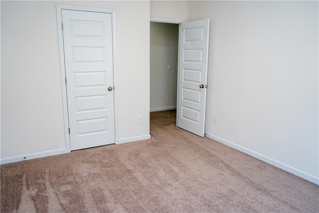 2115 Ravencliff Drive Austell, GA 30168 - Photo 10 of 21 an empty room with closet