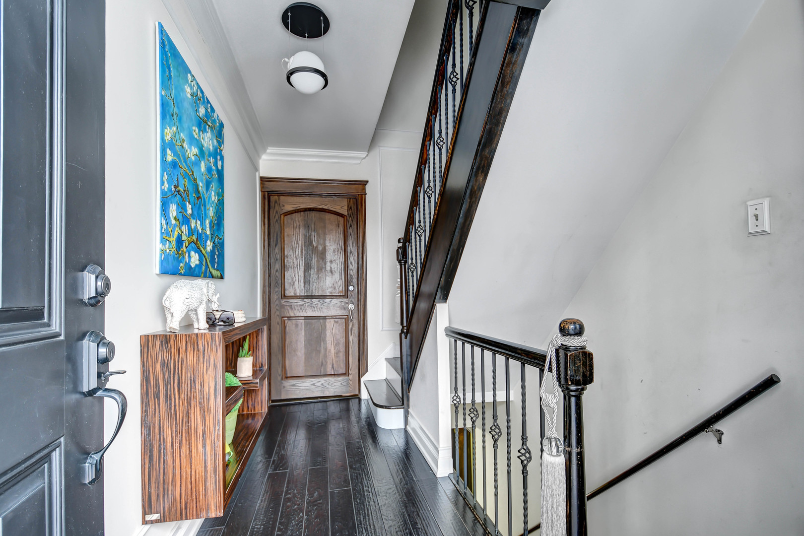 491 Old Surrey Road, Unit A Hinsdale, IL 60521 - Photo 2 of 23 a view of an entryway with wooden floor