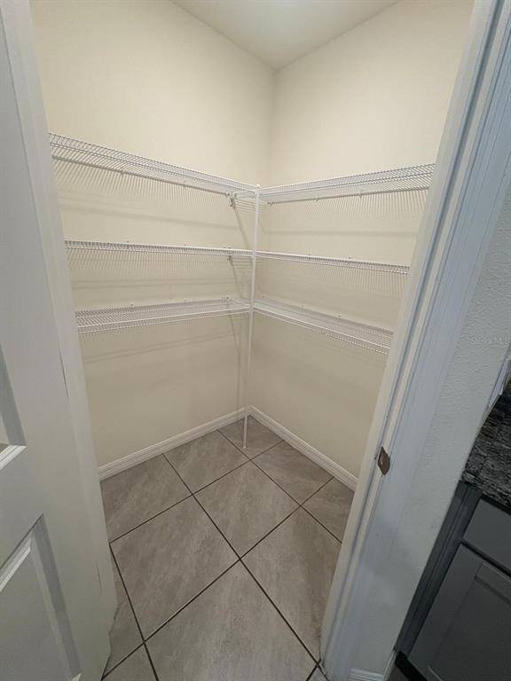 6910 Southeast 112th Street Belleview, FL 34420 - Photo 12 of 20 a bathroom with a bathtub