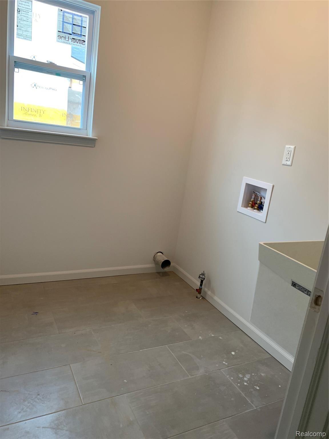 42891 Colonial Road Belleville, MI 48111 - Photo 5 of 14 1st Floor Laundry