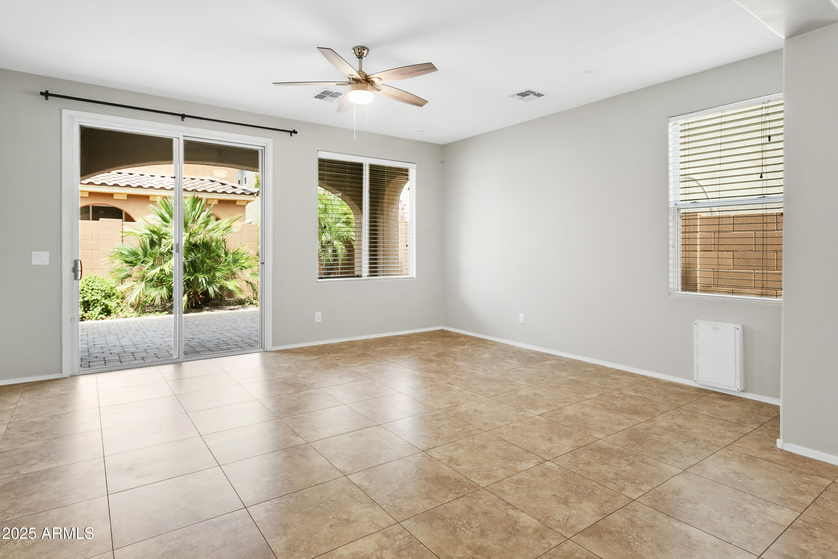 9124 South Roberts Road Tempe, AZ 85284 - Photo 12 of 27 a view of an empty room with a window
