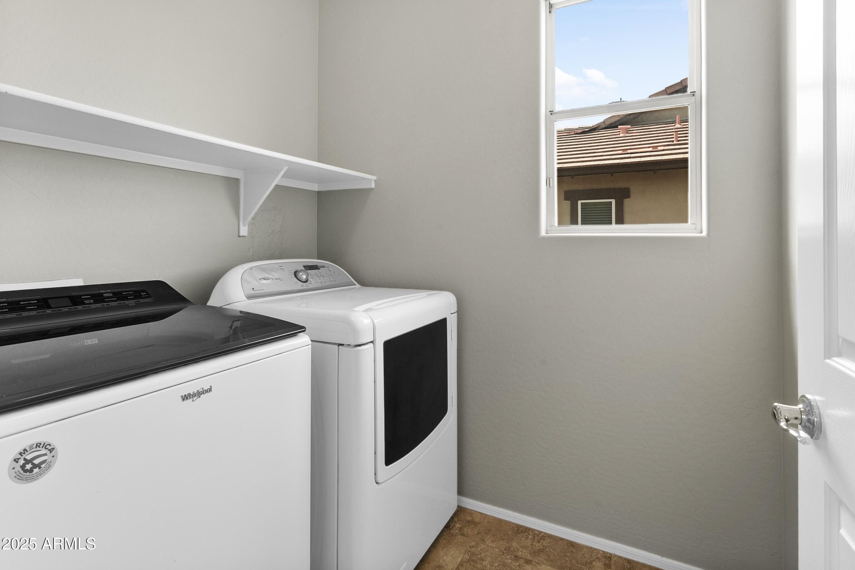 9124 South Roberts Road Tempe, AZ 85284 - Photo 17 of 27 a utility room with dryer and washer