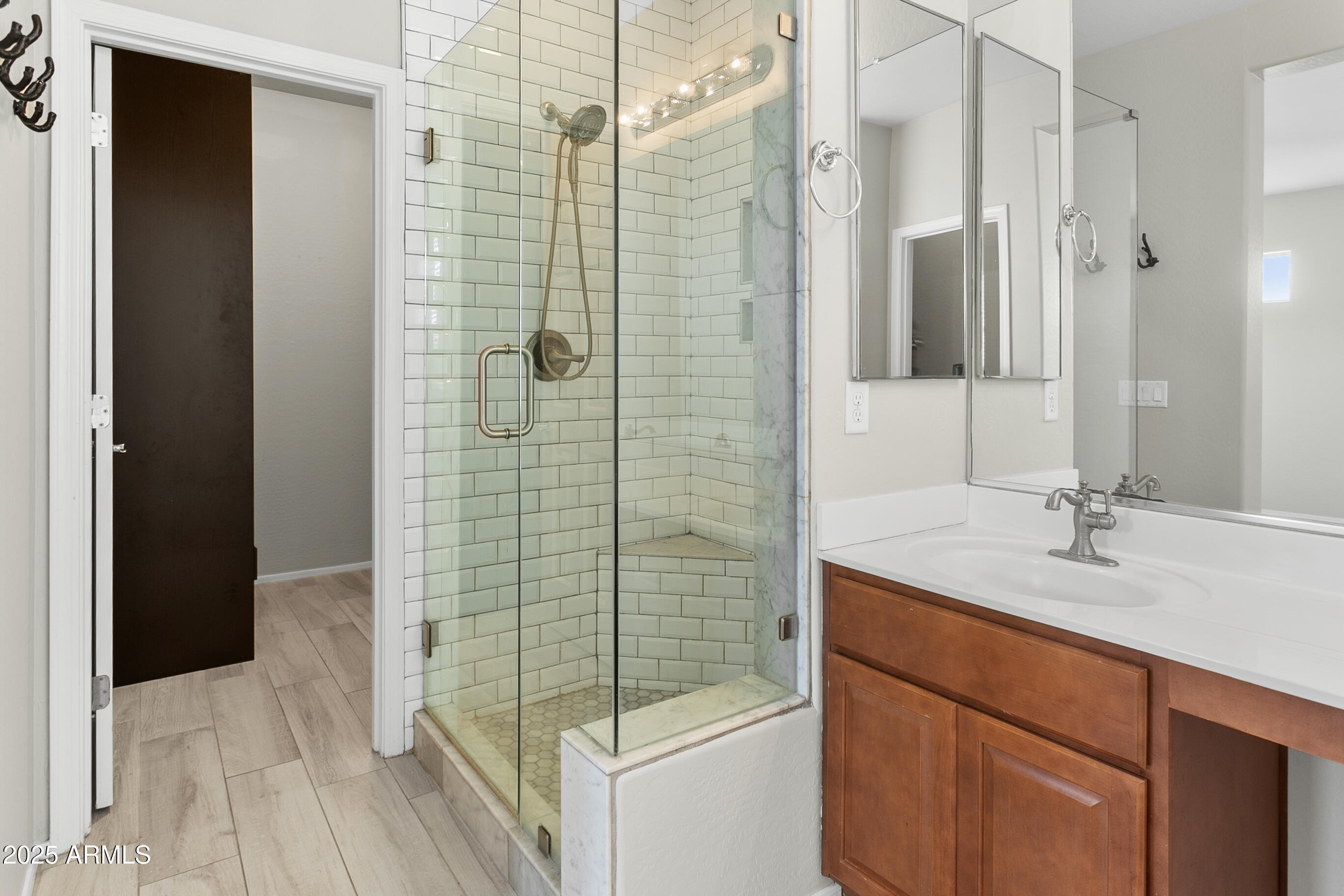 9124 South Roberts Road Tempe, AZ 85284 - Photo 23 of 27 a bathroom with a shower and a sink