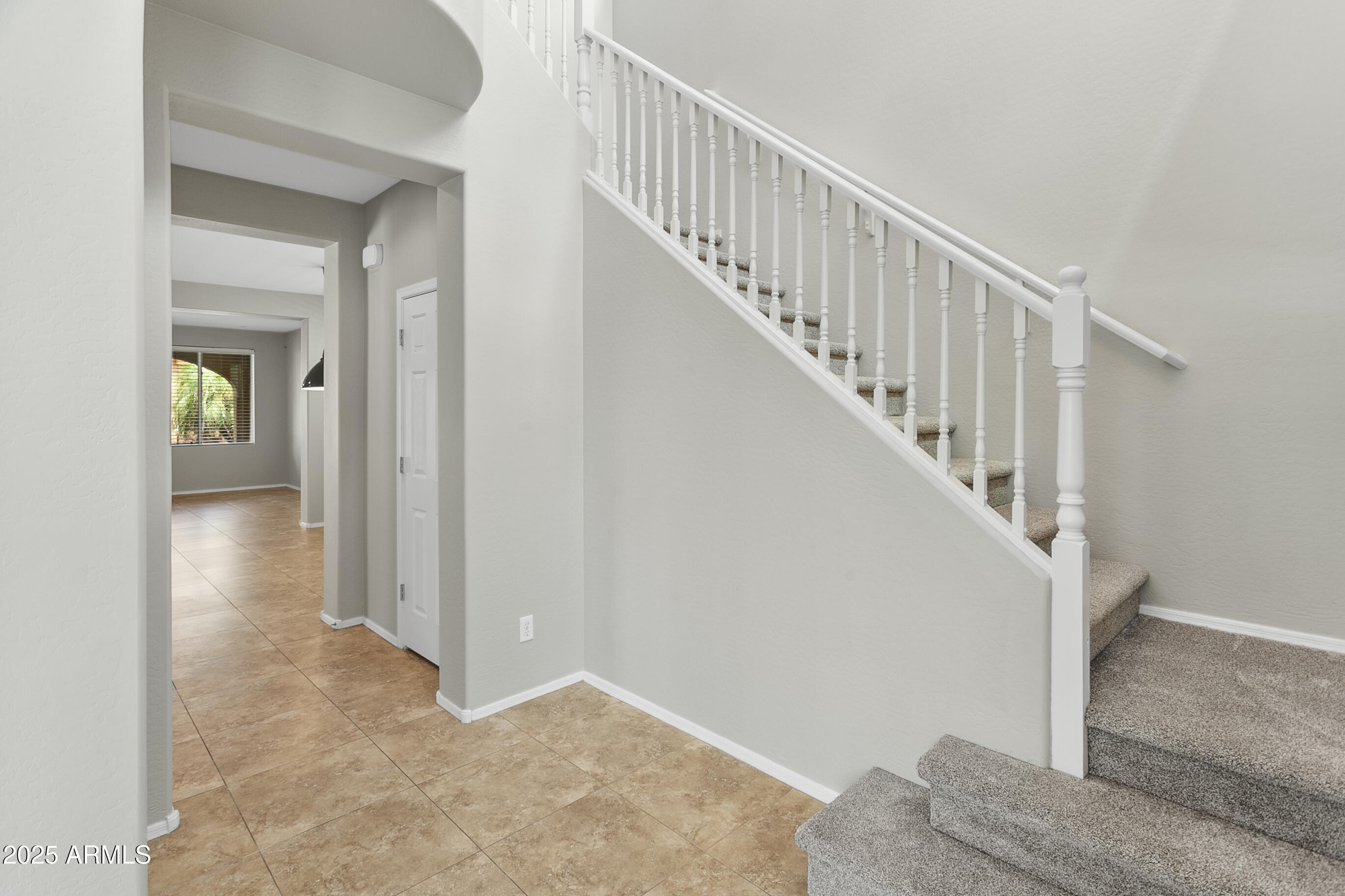 9124 South Roberts Road Tempe, AZ 85284 - Photo 4 of 27 a view of a hallway with staircase