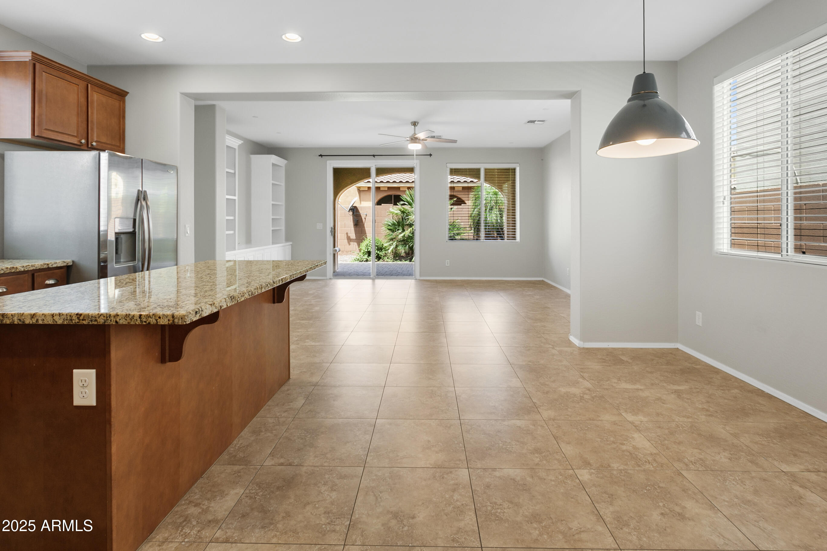 9124 South Roberts Road Tempe, AZ 85284 - Photo 6 of 27 a lobby with chandelier and wooden floor