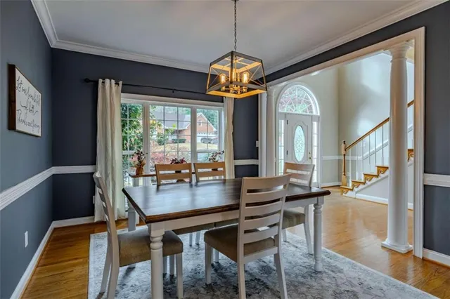 a living room with furniture flat screen tv and a fireplace