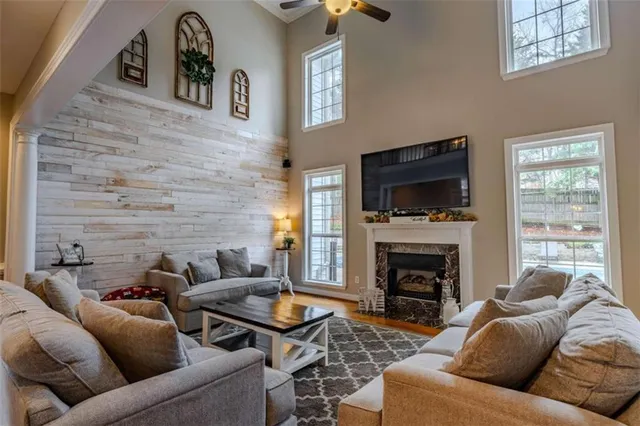 a living room with furniture and a table