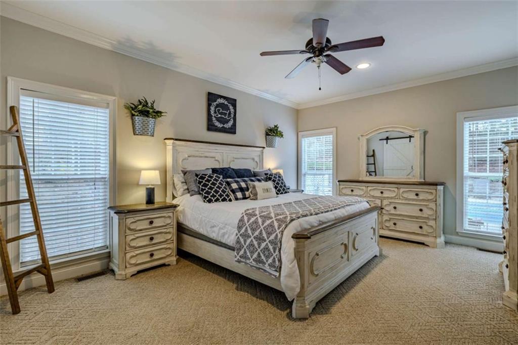 26 Saddlebrook Drive Rome, GA 30161 - Photo 23 of 63 a bedroom with a bed dresser and a window