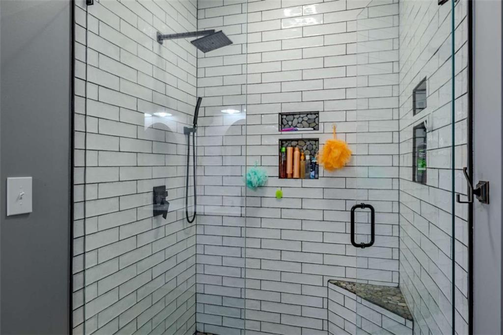 26 Saddlebrook Drive Rome, GA 30161 - Photo 27 of 63 a bathroom with a shower